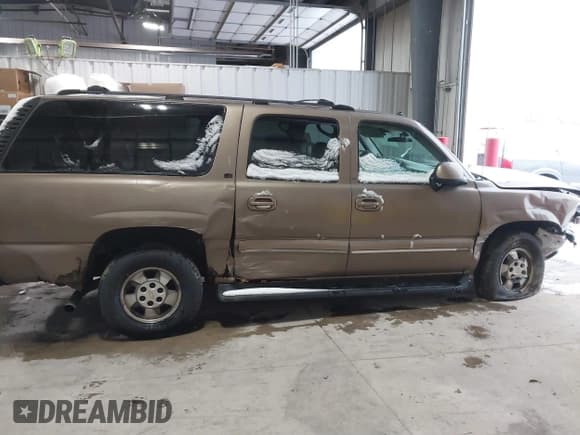 ✅ 2003 Chevrolet Suburban LT • VIN: 1GNFK16Z33J199860 • Лот: 41538369. Опубликован ранее на IAAI с пробегом Не указан. Бесплатный доступ к архиву аукционных продаж из США и подробный отчёт об истории автомобиля на DreamBid. Изображение 14.
