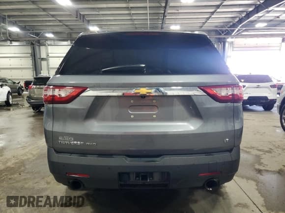 ✅ 2021 Chevrolet Traverse LT Cloth • VIN: 1GNEVGKW2MJ192093 • Lot: 84745035. Wystawiony na Copart z przebiegiem 106 829 mil. Bezpłatny archiwum sprzedaży aukcyjnych z USA i szczegółowy raport historii pojazdu na DreamBid. Zdjęcie 6.