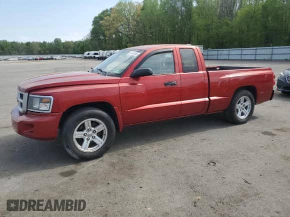 2008 Dodge Dakota SXT with VIN 1D7HE32K78S601576, listed as a Copart auction lot 55464055 with 64,793 mi miles and Salvage title. Bid and sale history available at DreamBid. Image 1.