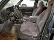 ✅ 1998 Jeep Cherokee Sport • VIN: 1J4FJ68S9WL122356 • Лот: 90879665. Опубликован ранее на Copart с пробегом 264 909 миль. Бесплатный доступ к архиву аукционных продаж из США и подробный отчёт об истории автомобиля на DreamBid. Изображение 7.