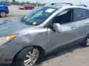 ✅ 2011 Hyundai Tucson Limited • VIN: KM8JUCACXBU213998 • Lot: 42937468. Listed on IAAI with 199,789 mi. Free auction sales archive from the USA and detailed vehicle history report at DreamBid. Image 6.