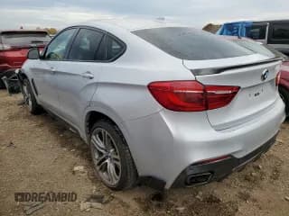 ✅ 2016 BMW X6 xDrive35i • VIN: 5UXKU2C59G0N83743 • Лот: 64436252. Опубликован ранее на Copart с пробегом 74 374 миль. Бесплатный доступ к архиву аукционных продаж из США и подробный отчёт об истории автомобиля на DreamBid. Изображение 3.