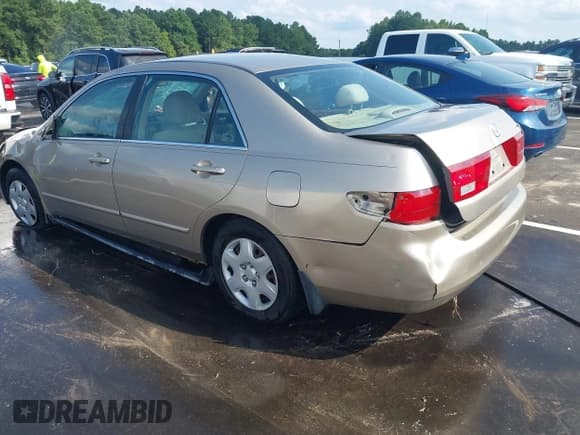 ✅ 2005 Honda Accord LX • VIN: 3HGCM56415G703507 • Lot: 43015432. Listed on IAAI with 219,338 mi. Free auction sales archive from the USA and detailed vehicle history report at DreamBid. Image 3.