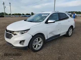 ✅ 2021 Chevrolet Equinox Premier • VIN: 3GNAXXEV6MS124518 • Lot: 71091765. Listed on Copart with 57,552 mi. Free auction sales archive from the USA and detailed vehicle history report at DreamBid. Image 1.