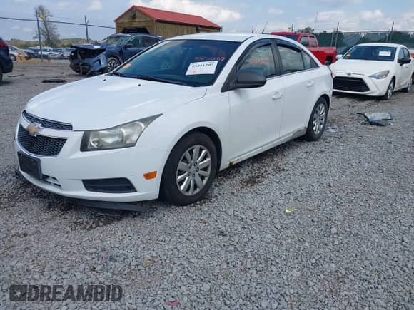 2011 Chevrolet Cruze LS z VIN 1G1PC5SH7B7158067, wystawiony jako IAAI lot #43251207 z przebiegiem 162 557 mil mil oraz . Historia ofert i sprzedaży dostępna na DreamBid. Obrazek 20.