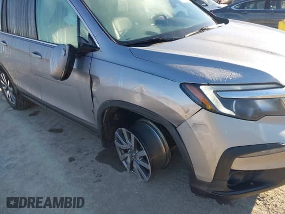 ✅ 2020 Honda Pilot EX-L • VIN: 5FNYF6H57LB054745 • Лот: 43482276. Опубликован ранее на IAAI с пробегом 57 136 миль. Бесплатный доступ к архиву аукционных продаж из США и подробный отчёт об истории автомобиля на DreamBid. Изображение 6.