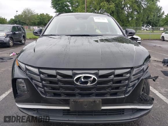 ✅ 2022 Hyundai Tucson SEL • VIN: KM8JBCAE6NU031615 • Lot: 42887395. Listed on IAAI with 63,078 mi. Free auction sales archive from the USA and detailed vehicle history report at DreamBid. Image 12.