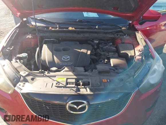 ✅ 2014 Mazda CX-5 Grand Touring • VIN: JM3KE4DY0E0363009 • Lot: 43713061. Listed on IAAI with 105,703 mi. Free auction sales archive from the USA and detailed vehicle history report at DreamBid. Image 10.