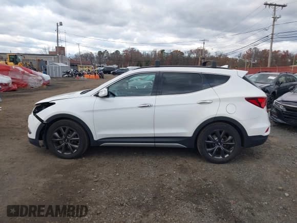 ✅ 2017 Hyundai Santa Fe Ultimate • VIN: 5XYZWDLA8HG456092 • Lot: 43701187. Listed on IAAI with 97,121 mi. Free auction sales archive from the USA and detailed vehicle history report at DreamBid. Image 14.