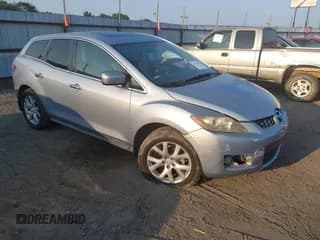 ✅ 2007 Mazda CX-7 Grand Touring • VIN: JM3ER293070112495 • Lot: 43249222. Wystawiony na IAAI z przebiegiem 153 474 mil. Bezpłatny archiwum sprzedaży aukcyjnych z USA i szczegółowy raport historii pojazdu na DreamBid. Zdjęcie 1.