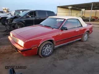 ✅ 1985 Chevrolet Cavalier • VIN: 1G1JE67W1F7185395 • Лот: 80670104. Опубликован ранее на Copart с пробегом 5 776 миль. Бесплатный доступ к архиву аукционных продаж из США и подробный отчёт об истории автомобиля на DreamBid. Изображение 1.