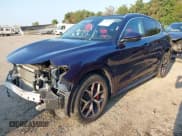 ✅ 2021 Alfa Romeo Stelvio Ti • VIN: ZASPAKBN3M7D17372 • Lot: 42480267. Listed on IAAI with 43,992 mi. Free auction sales archive from the USA and detailed vehicle history report at DreamBid. Image 2.