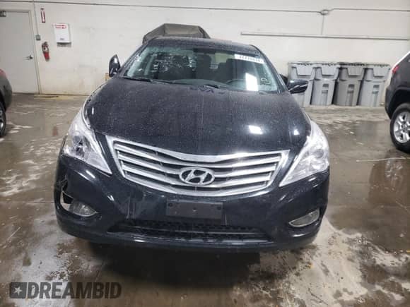 2013 Hyundai Azera z VIN KMHFH4JG3DA326747, wystawiony jako Copart lot #77778874 z przebiegiem 75 472 mil mil oraz Szkoda całkowita • Salvage title. Historia ofert i sprzedaży dostępna na DreamBid. Obrazek 5.