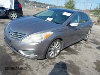 2013 Hyundai Azera z VIN KMHFH4JG7DA260834, wystawiony jako IAAI lot #41524437 z przebiegiem 152 992 mil mil oraz . Historia ofert i sprzedaży dostępna na DreamBid. Obrazek 2.