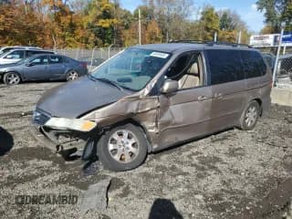 ✅ 2004 Honda Odyssey EX-L • VIN: 5FNRL18944B107048 • Lot: 90859955. Listed on Copart with Not provided. Free auction sales archive from the USA and detailed vehicle history report at DreamBid. Image 1.