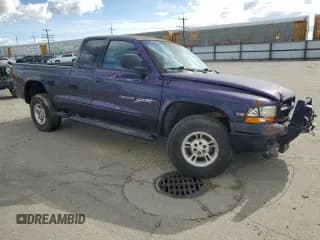 ✅ 1998 Dodge Dakota SLT • VIN: 1B7GG22Y8WS657716 • Lot: 51266605. Wystawiony na Copart z przebiegiem 234 149 mil. Bezpłatny archiwum sprzedaży aukcyjnych z USA i szczegółowy raport historii pojazdu na DreamBid. Zdjęcie 4.