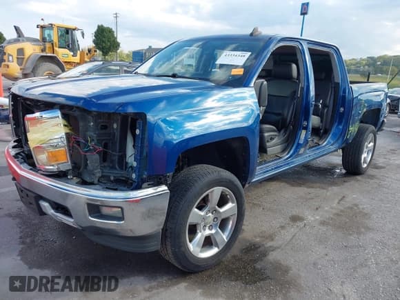 ✅ 2015 Chevrolet Silverado 1500 LT • VIN: 3GCUKREC8FG506988 • Lot: 43334348. Listed on IAAI with 143,636 mi. Free auction sales archive from the USA and detailed vehicle history report at DreamBid. Image 2.