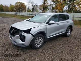 2019 Hyundai Santa Fe SE с VIN 5NMS2CAD9KH102678, выставлен на аукционе Copart как лот 86086815 с пробегом 82 016 миль миль и Списание • Salvage title. История ставок и продаж доступна на DreamBid. Изображение 1.