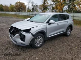 ✅ 2019 Hyundai Santa Fe SE • VIN: 5NMS2CAD9KH102678 • Lot: 86086815. Wystawiony na Copart z przebiegiem 82 016 mil. Bezpłatny archiwum sprzedaży aukcyjnych z USA i szczegółowy raport historii pojazdu na DreamBid. Zdjęcie 1.