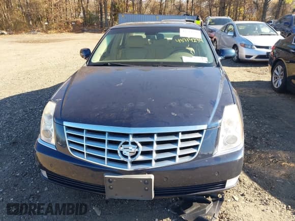 ✅ 2006 Cadillac DTS 1SC • VIN: 1G6KD57Y56U112254 • Lot: 43714234. Listed on IAAI with 73,049 mi. Free auction sales archive from the USA and detailed vehicle history report at DreamBid. Image 6.