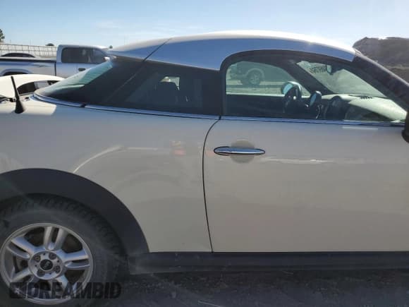 ✅ 2012 MINI Coupe • VIN: WMWSX1C58CT300032 • Lot: 72469764. Listed on Copart with Not provided. Free auction sales archive from the USA and detailed vehicle history report at DreamBid. Image 10.