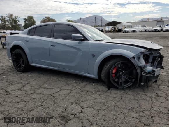 ✅ 2022 Dodge Charger SRT Hellcat Widebody • VIN: 2C3CDXL91NH100717 • Лот: 82333965. Опубликован ранее на Copart с пробегом 33 982 миль. Бесплатный доступ к архиву аукционных продаж из США и подробный отчёт об истории автомобиля на DreamBid. Изображение 4.