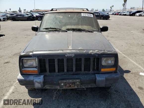 ✅ 1999 Jeep Cherokee Sport • VIN: 1J4FT68S0XL555883 • Lot: 51016255. Listed on Copart with 128,306 mi. Free auction sales archive from the USA and detailed vehicle history report at DreamBid. Image 5.