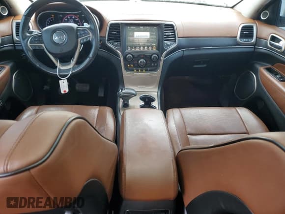 ✅ 2015 Jeep Grand Cherokee Summit • VIN: 1C4RJFJG1FC832070 • Lot: 71791905. Listed on Copart with 129,895 mi. Free auction sales archive from the USA and detailed vehicle history report at DreamBid. Image 8.