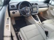 ✅ 2012 Volkswagen Eos Komfort • VIN: WVWBW7AH7CV021617 • Лот: 63940455. Опубликован ранее на Copart с пробегом 115 987 миль. Бесплатный доступ к архиву аукционных продаж из США и подробный отчёт об истории автомобиля на DreamBid. Изображение 8.