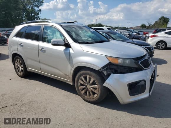 ✅ 2011 Kia Sorento SX • VIN: 5XYKWDA2XBG143419 • Лот: 71085595. Опубликован ранее на Copart с пробегом 169 188 миль. Бесплатный доступ к архиву аукционных продаж из США и подробный отчёт об истории автомобиля на DreamBid. Изображение 4.