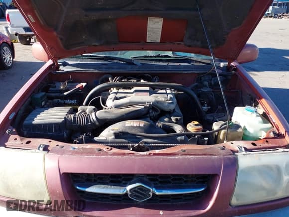 ✅ 2000 Suzuki Grand Vitara JLX • VIN: JS3TD62V2Y4116559 • Lot: 43787943. Listed on IAAI with 247,631 mi. Free auction sales archive from the USA and detailed vehicle history report at DreamBid. Image 10.