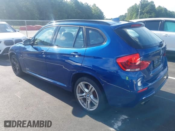✅ 2014 BMW X1 xDrive28i • VIN: WBAVL1C54EVY20003 • Lot: 43036828. Listed on IAAI with 138,476 mi. Free auction sales archive from the USA and detailed vehicle history report at DreamBid. Image 3.