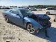 2021 Dodge Challenger R/T with VIN 2C3CDZBT4MH571347, listed as a Copart auction lot 86241135 with 76,060 mi miles and Salvage title. Bid and sale history available at DreamBid. Image 4.