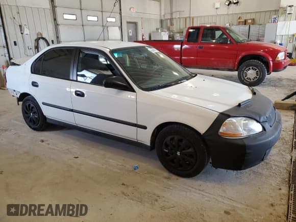 ✅ 1998 Honda Civic DX • VIN: 2HGEJ662XWH553744 • Lot: 48888615. Listed on Copart with 233,936 mi. Free auction sales archive from the USA and detailed vehicle history report at DreamBid. Image 4.
