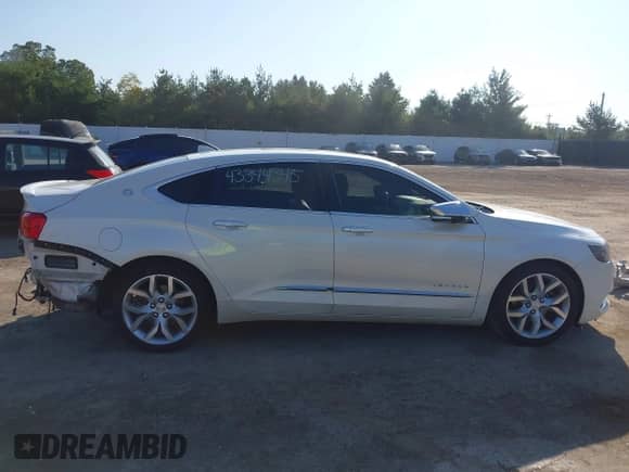 2014 Chevrolet Impala LTZ with VIN 1G1155S32EU122071, listed as a IAAI auction lot 43344345 with 151,734 mi miles and . Bid and sale history available at DreamBid. Image 14.