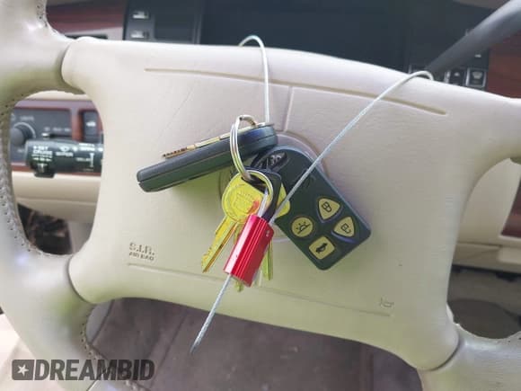 ✅ 1994 Cadillac DeVille • VIN: 1G6KD52B9RU272998 • Lot: 42797569. Listed on IAAI with 63,176 mi. Free auction sales archive from the USA and detailed vehicle history report at DreamBid. Image 11.