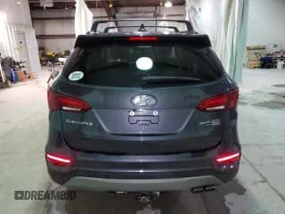 ✅ 2017 Hyundai Santa Fe Ultimate • VIN: 5XYZWDLAXHG448625 • Лот: 72946722. Опубликован ранее на Copart с пробегом 104 323 миль. Бесплатный доступ к архиву аукционных продаж из США и подробный отчёт об истории автомобиля на DreamBid. Изображение 6.