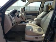 ✅ 2010 Mercury Mariner Premier • VIN: 4M2CN9HG7AKJ26845 • Lot: 66954244. Wystawiony na Copart z przebiegiem 168 204 mil. Bezpłatny archiwum sprzedaży aukcyjnych z USA i szczegółowy raport historii pojazdu na DreamBid. Zdjęcie 7.