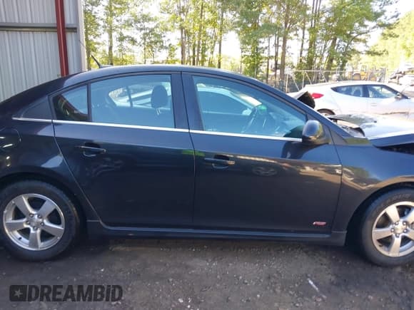 ✅ 2014 Chevrolet Cruze 1LT • VIN: 1G1PC5SB8E7263524 • Lot: 43338890. Listed on IAAI with 112,837 mi. Free auction sales archive from the USA and detailed vehicle history report at DreamBid. Image 13.