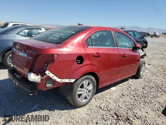 2012 Chevrolet Sonic LT с VIN 1G1JC5SB3C4216034, выставлен на аукционе Copart как лот 84113474 с пробегом 40 707 миль миль и Списание • Salvage title. История ставок и продаж доступна на DreamBid. Изображение 3.