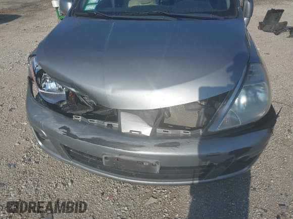 ✅ 2011 Nissan Versa S • VIN: 3N1BC1CP6BL457483 • Lot: 42949209. Listed on IAAI with 97,668 mi. Free auction sales archive from the USA and detailed vehicle history report at DreamBid. Image 6.