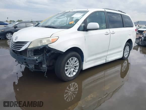 2011 Toyota Sienna XLE AAS with VIN 5TDYK3DC1BS106301, listed as a IAAI auction lot 43423294 with 158,803 mi miles and . Bid and sale history available at DreamBid. Image 18.