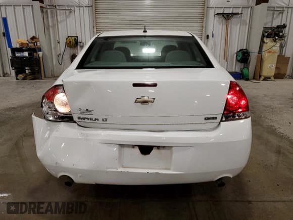 ✅ 2014 Chevrolet Impala LT • VIN: 2G1WB5E39E1110554 • Lot: 87414035. Listed on Copart with 151,244 mi. Free auction sales archive from the USA and detailed vehicle history report at DreamBid. Image 6.