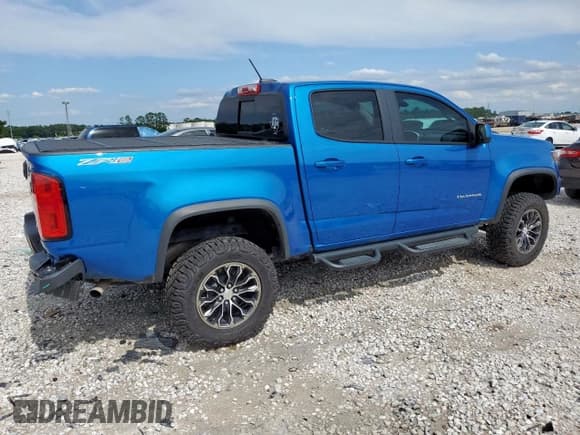 ✅ 2021 Chevrolet Colorado 4WD ZR2 • VIN: 1GCGTEEN7M1157788 • Lot: 58042845. Listed on Copart with 49,008 mi. Free auction sales archive from the USA and detailed vehicle history report at DreamBid. Image 3.