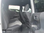 ✅ 2021 Toyota Tacoma SR • VIN: 3TMCZ5AN0MM387565 • Lot: 42300520. Listed on IAAI with 42,153 mi. Free auction sales archive from the USA and detailed vehicle history report at DreamBid. Image 8.