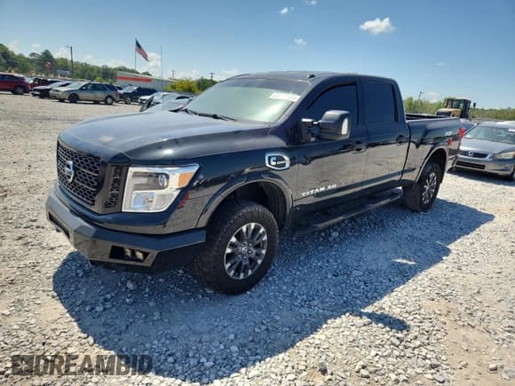 ✅ 2017 Nissan Titan Pro-4X • VIN: 1N6BA1F49HN509957 • Лот: 64818185. Опубликован ранее на Copart с пробегом Не указан. Бесплатный доступ к архиву аукционных продаж из США и подробный отчёт об истории автомобиля на DreamBid. Изображение 1.
