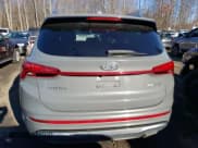 ✅ 2021 Hyundai Santa Fe Calligraphy • VIN: 5NMS5DAL4MH369119 • Lot: 81486633. Wystawiony na Copart z przebiegiem 41 233 mil. Bezpłatny archiwum sprzedaży aukcyjnych z USA i szczegółowy raport historii pojazdu na DreamBid. Zdjęcie 6.