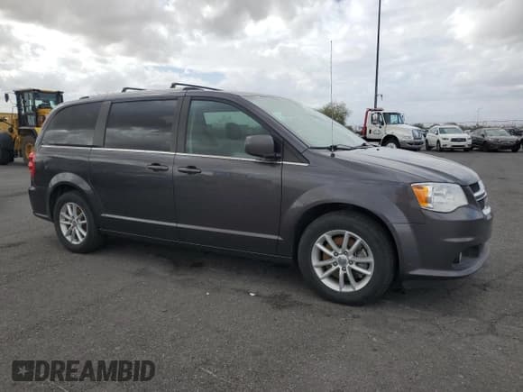 ✅ 2020 Dodge Grand Caravan SXT • VIN: 2C4RDGCG3LR179738 • Лот: 86101995. Опубликован ранее на Copart с пробегом 171 946 миль. Бесплатный доступ к архиву аукционных продаж из США и подробный отчёт об истории автомобиля на DreamBid. Изображение 4.
