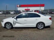 ✅ 2014 Volkswagen Jetta TDI w/Premium/Nav • VIN: 3VWLL7AJXEM366828 • Lot: 42392563. Listed on IAAI with 132,924 mi. Free auction sales archive from the USA and detailed vehicle history report at DreamBid. Image 14.