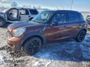 ✅ 2014 MINI Countryman S • VIN: WMWZC5C59EWP39467 • Lot: 94575355. Listed on Copart with 127,263 mi. Free auction sales archive from the USA and detailed vehicle history report at DreamBid. Image 1.